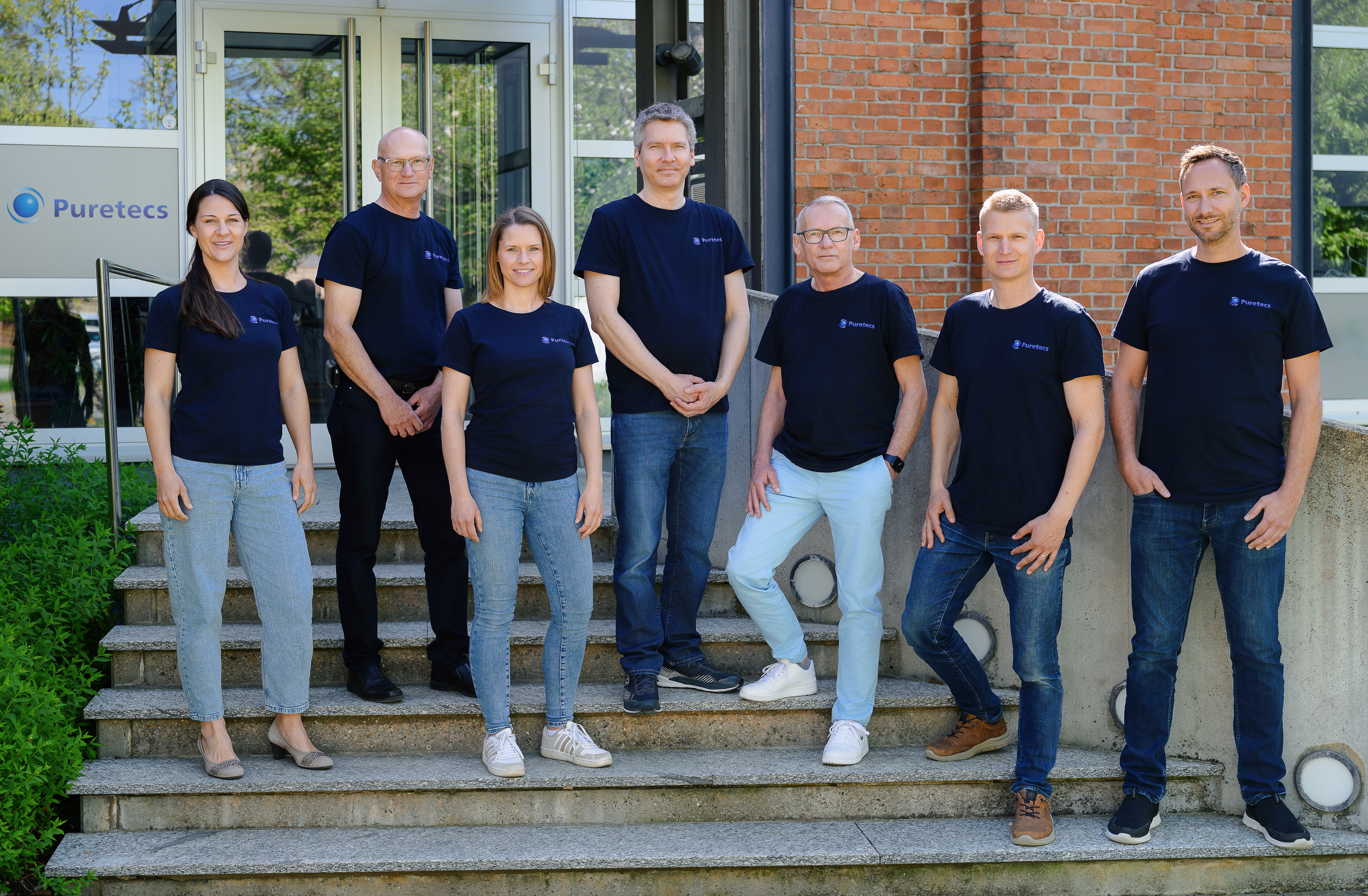 Puretecs team on the stairs